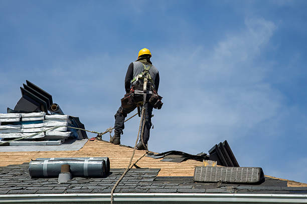 Professional Roofing technician working in Arlington Heights, MA